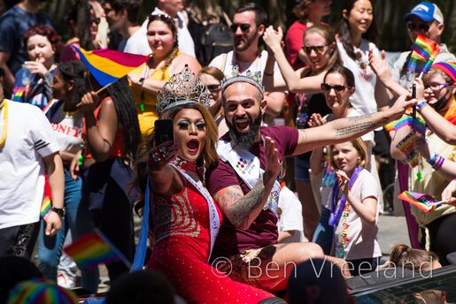 The king and queen of the 2019 Boston pride parade taking a selfie on their float