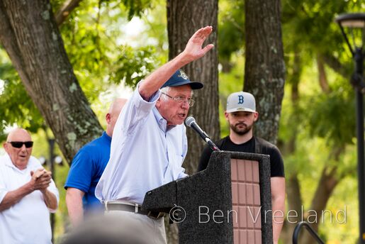 Vermont Senator Bernie Sanders speaking emphatically at a rally in support of unionization