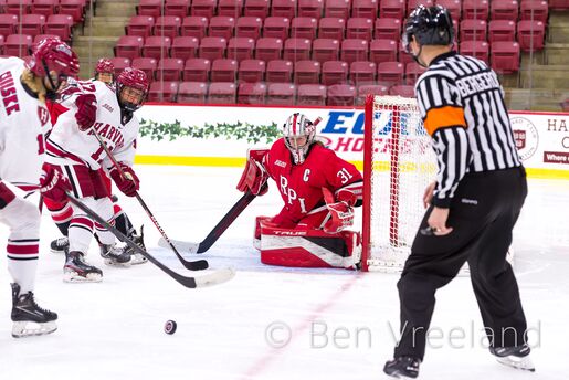 RPI women's hockey defends against Harvard with their goaltender captain guarding the crease